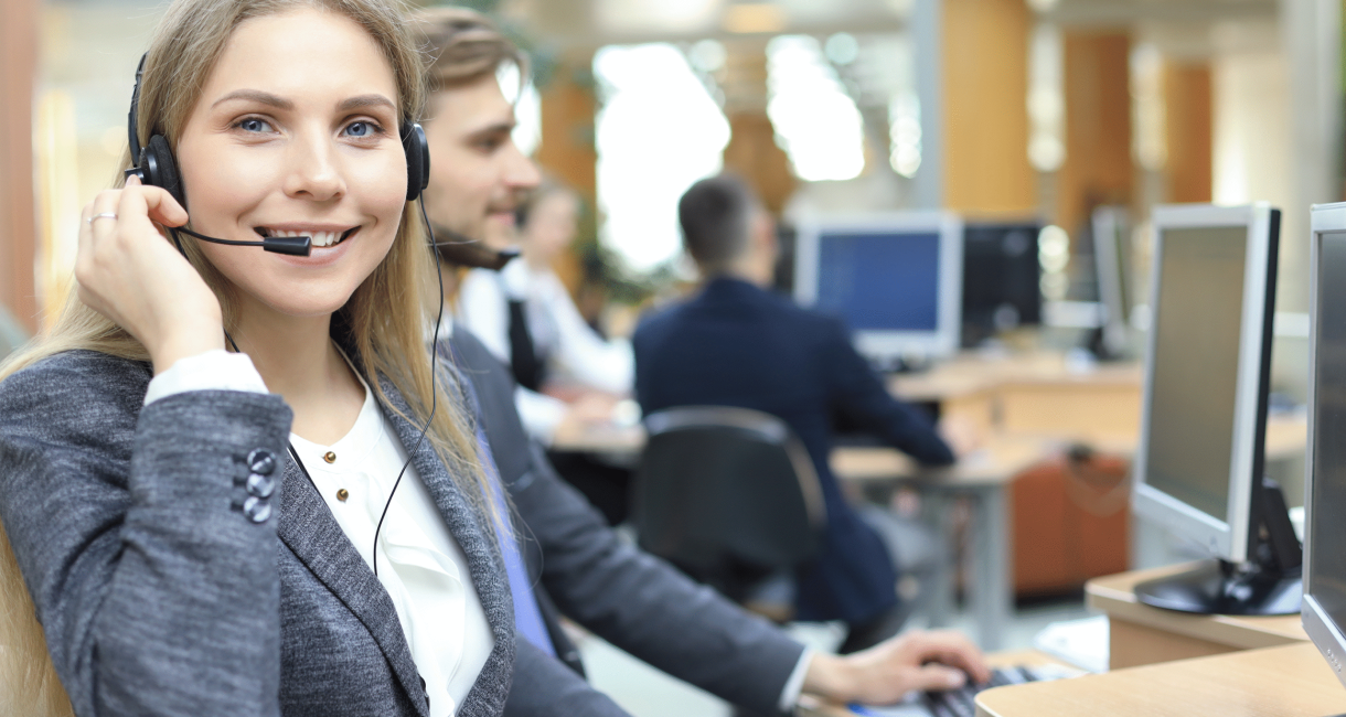 female-customer-support-operator-with-headset-smiling 1 female-customer-support-operator-with-headset-smiling 1