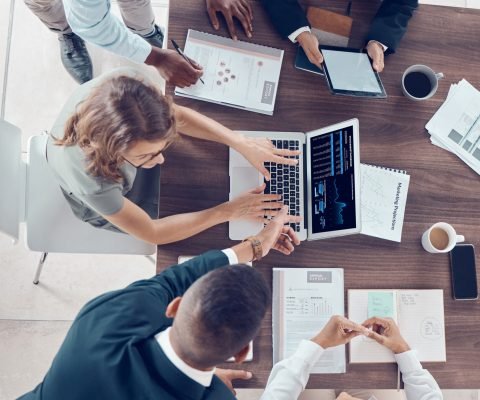 Planning, project management and marketing with business people in meeting for research, strategy a.